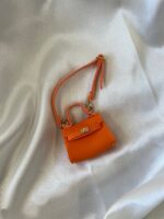 Labubu Miniature Luxury Handbag – Orange Leather Tote with Gold Lock
